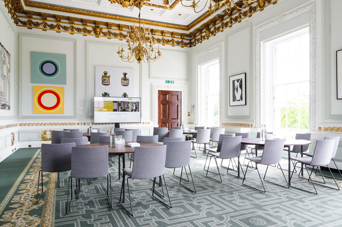 Radhakrishnan Room: elegant meeting space with ornate decor for professional gatherings.