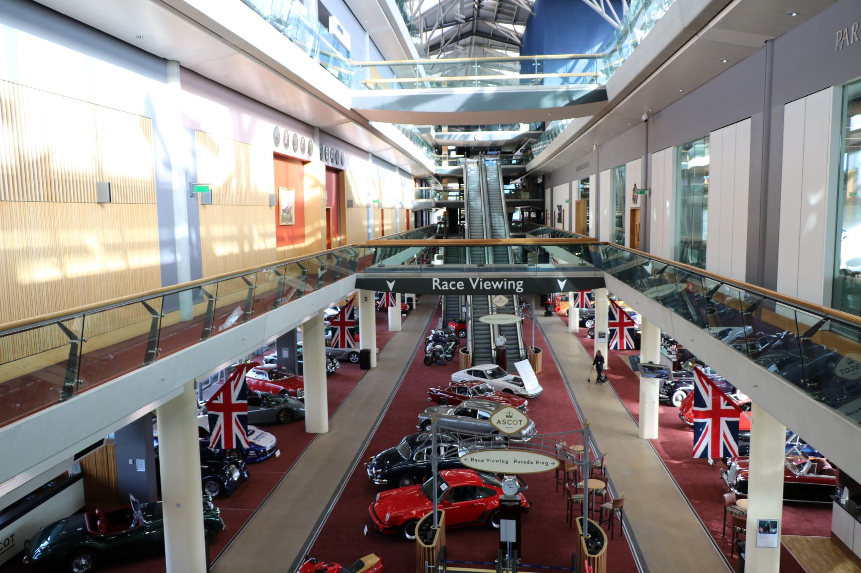 Grandstand Concourse at Ascot Racecourse with vintage cars for automotive exhibitions.