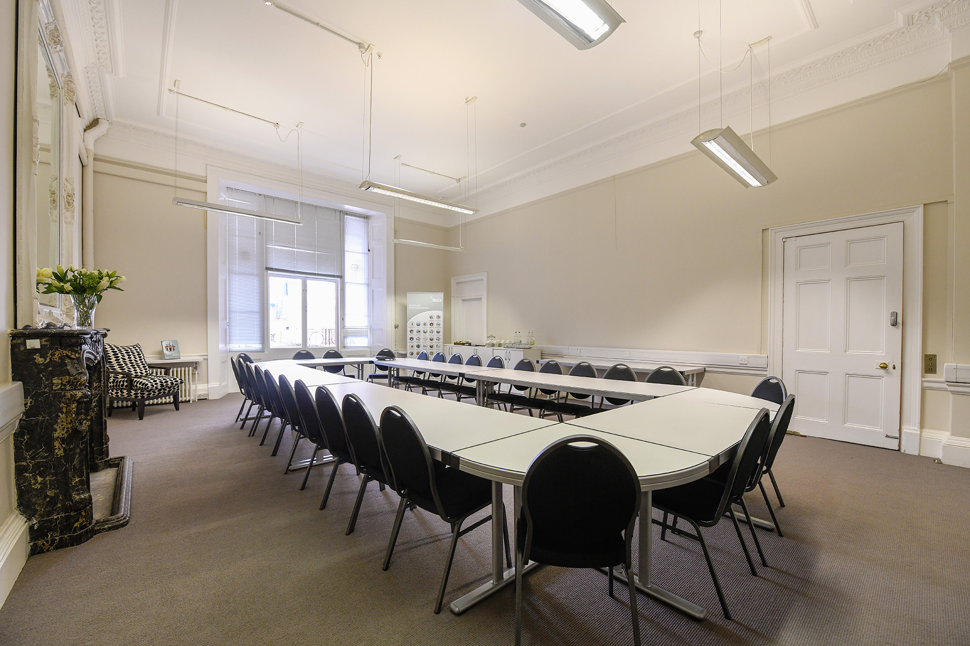 Leverhulme Room in SCI Belgravia, U-shaped table setup for conferences and workshops.