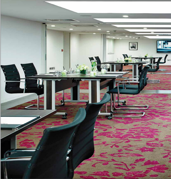 Modern Mayfair Suite at London Marriott, featuring ergonomic chairs for corporate meetings.