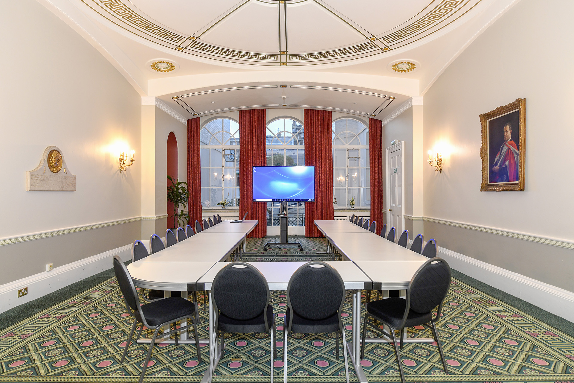 Council Room in SCI Belgravia, elegant meeting space with natural light for professional gatherings.