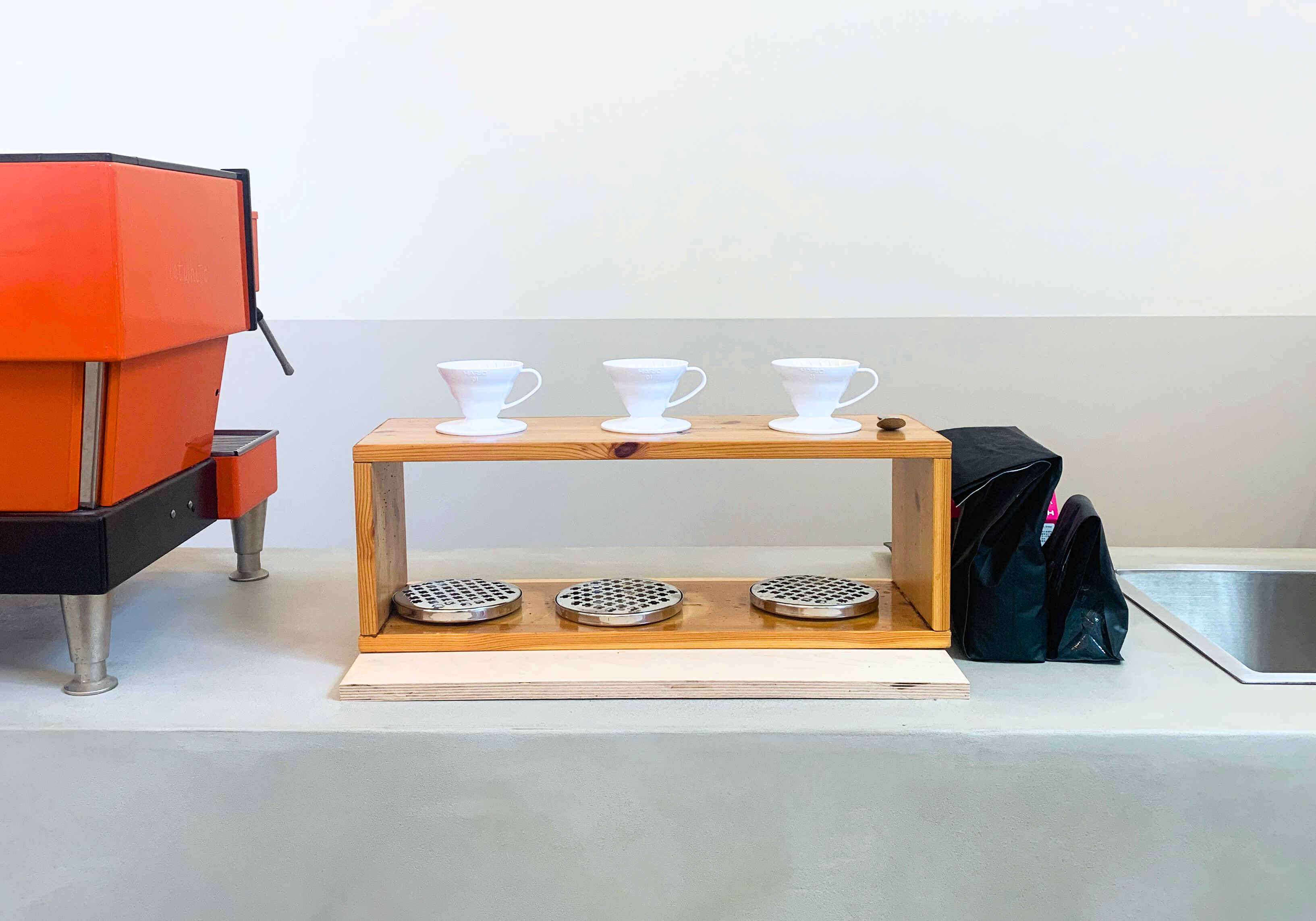 Meeting Room in ARK coworking with espresso machine, ideal for professional events.