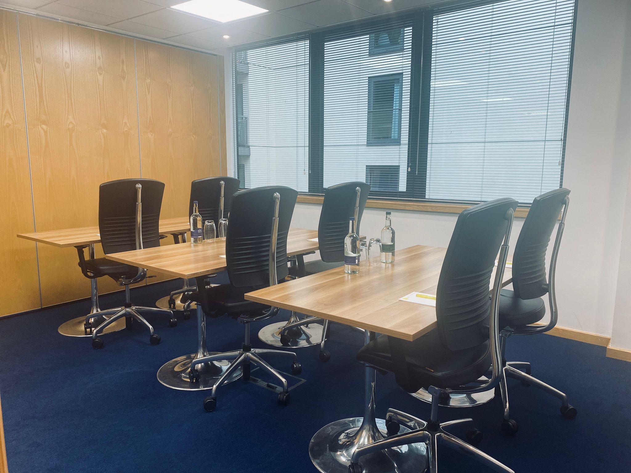 Dali Regal Court meeting room with modern tables, ideal for workshops and strategy sessions.