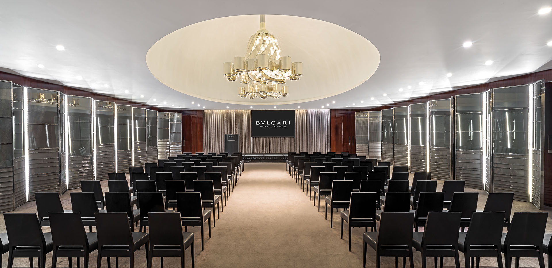 Ballroom at Bulgari Hotel London, featuring elegant chandelier for corporate events.