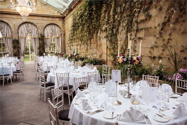 Victorian Orangery dining area with elegant tables, perfect for weddings and corporate events.