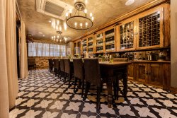 Sophisticated meeting space with wooden table, ideal for executive gatherings and networking.