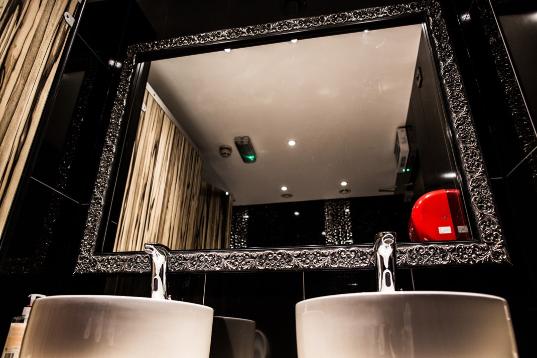 Stylish modern restroom at The Bridge London with elegant fixtures for events.