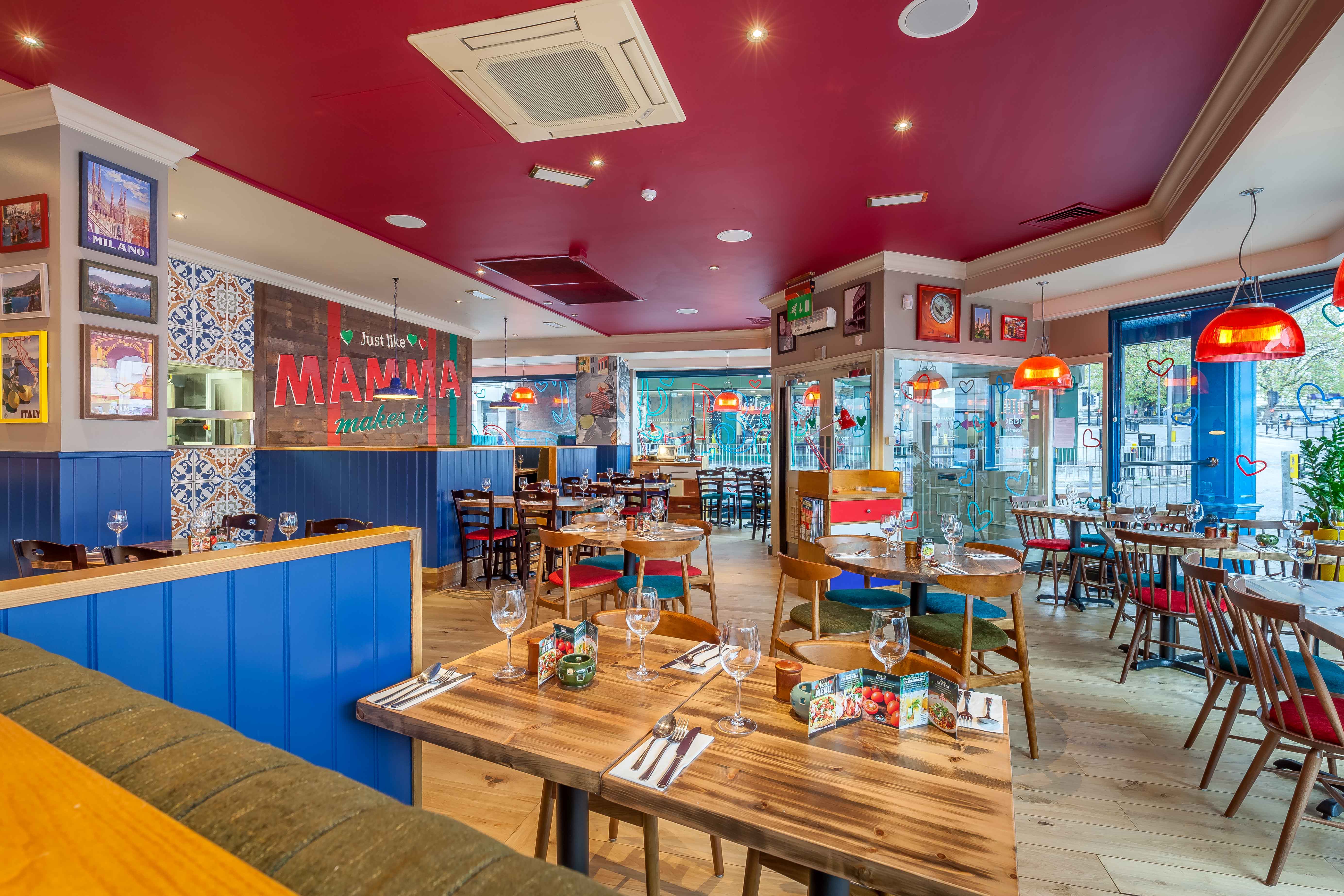 Vibrant Tuscany Room in Bella Italia Liverpool, perfect for casual meetings and events.