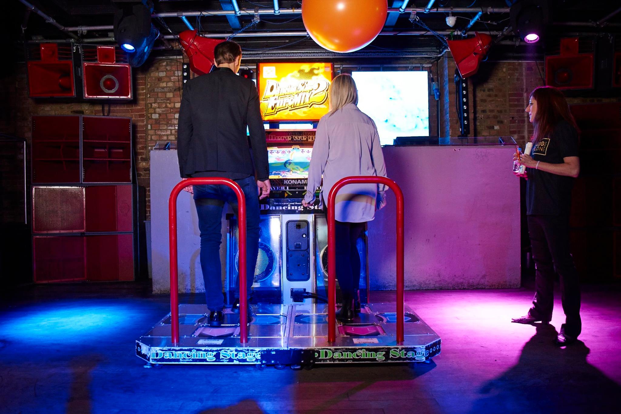 Dynamic event space with interactive dance game at Egg LDN for team-building and mixers.
