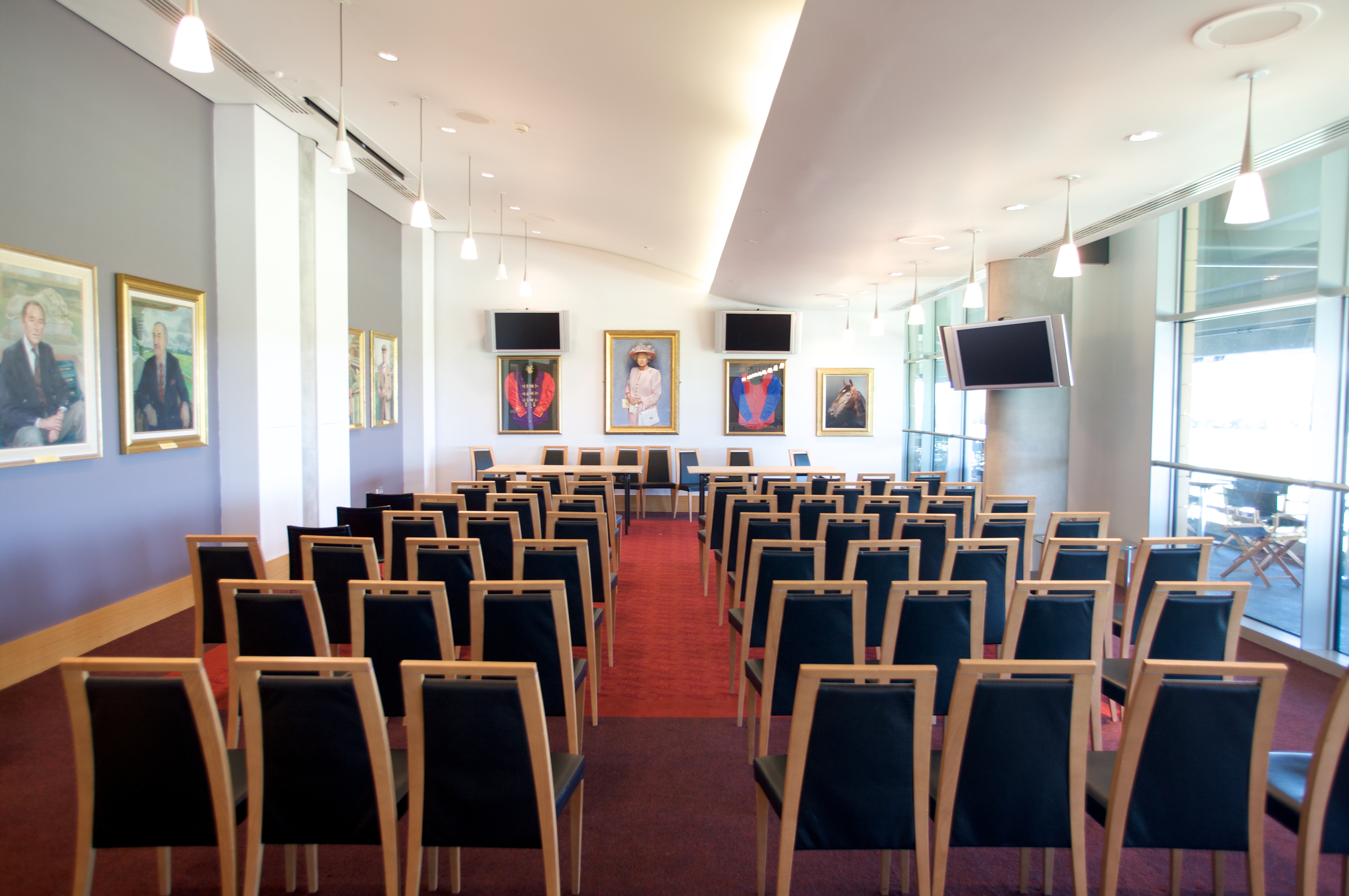Ascot Authority Suite meeting room with modern chairs for events and presentations.