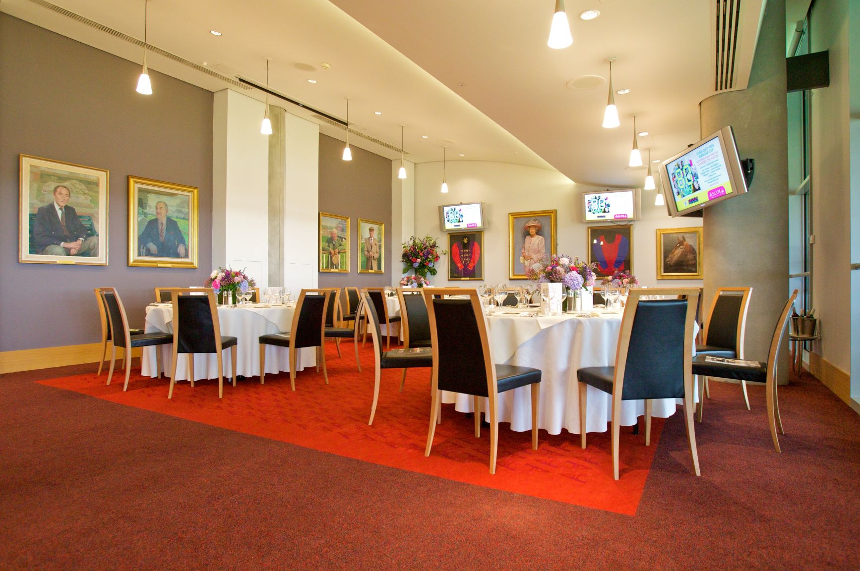 Ascot Authority Suite with elegant tables, ideal for corporate events and gatherings.