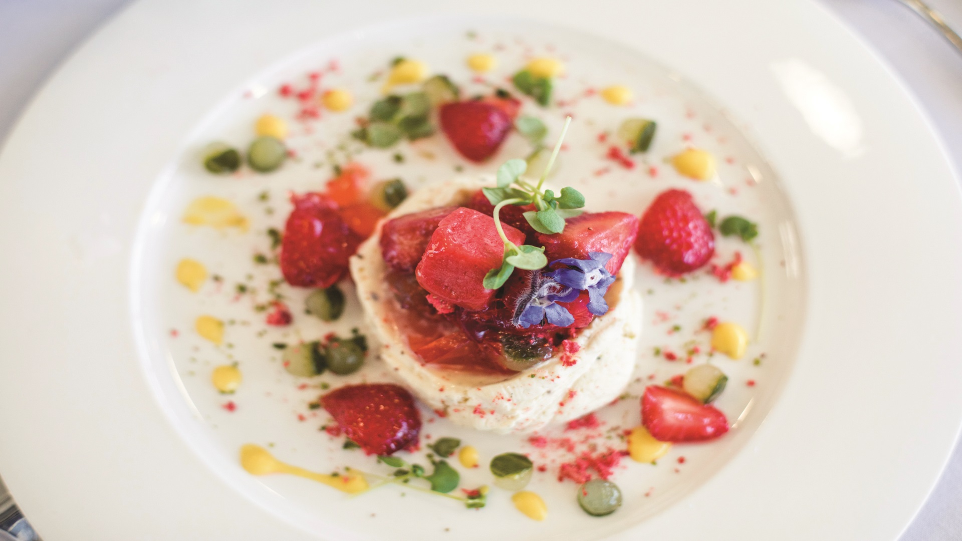 Elegant dessert with strawberries at Ascot Racecourse hospitality event.