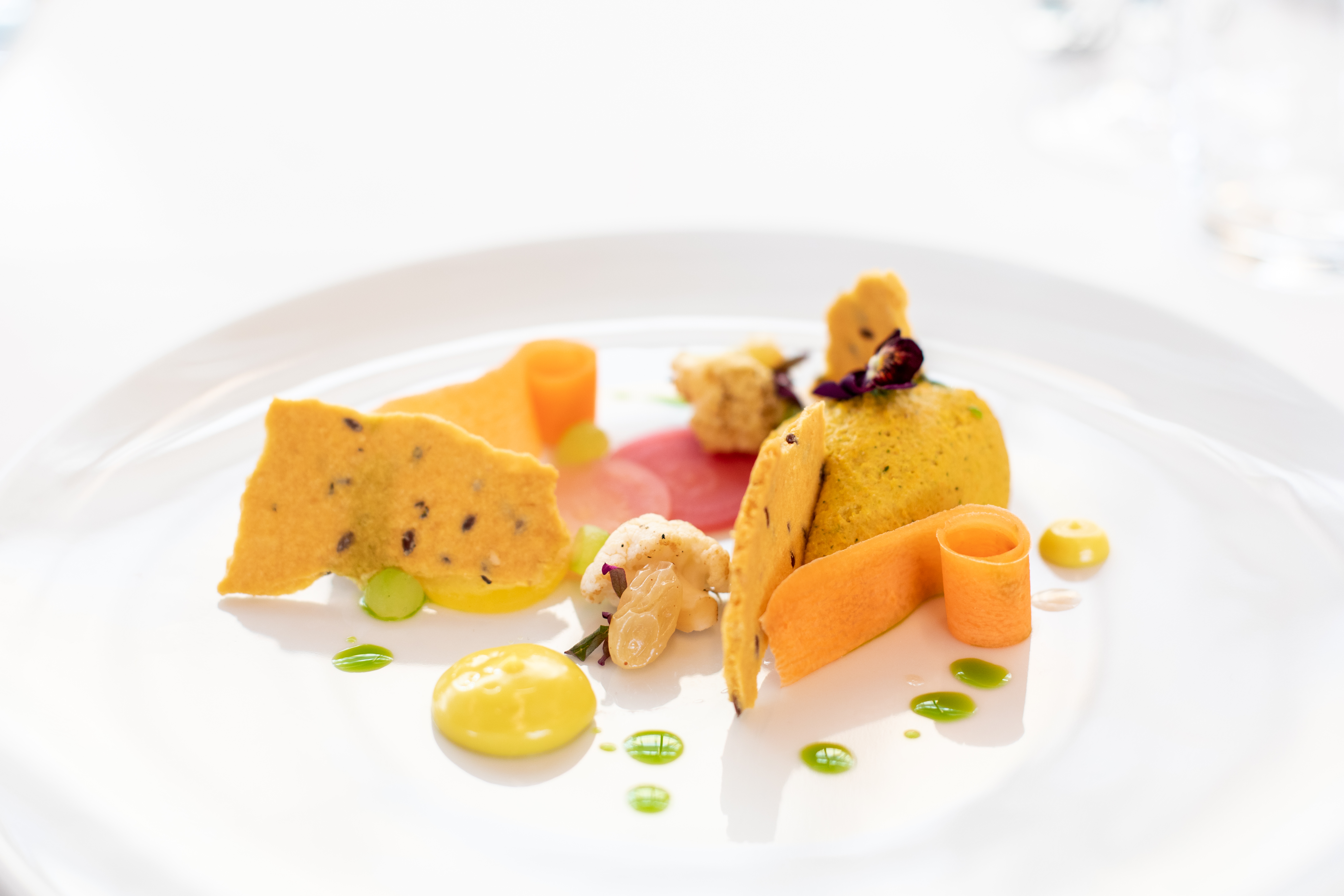 Gourmet dish in The Furlong Suite, Ascot Racecourse; elegant catering for events.