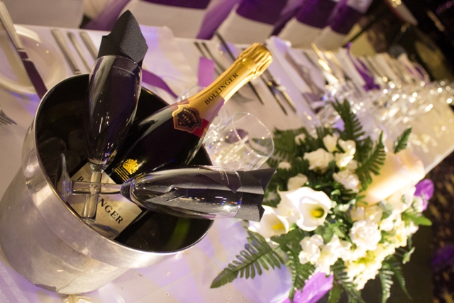 Elegant table setting with champagne for upscale events in Viva Blackpool.