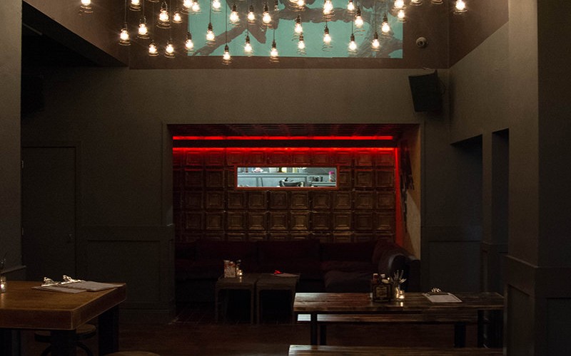 Stylish event space in Arts Club Liverpool with warm lighting for gatherings and networking.