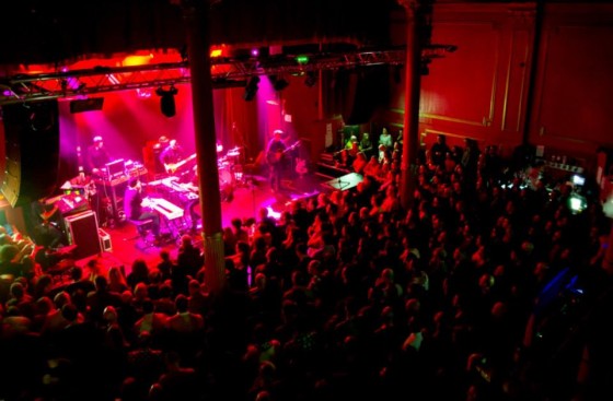 Vibrant live music event at Arts Club Liverpool with dynamic lighting and engaged audience.