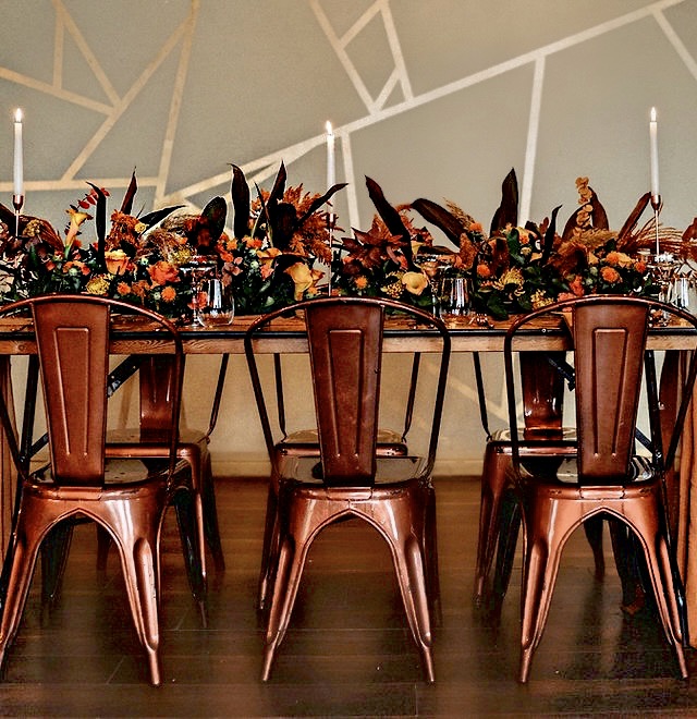 Elegant meeting space with floral centerpieces, perfect for networking events.