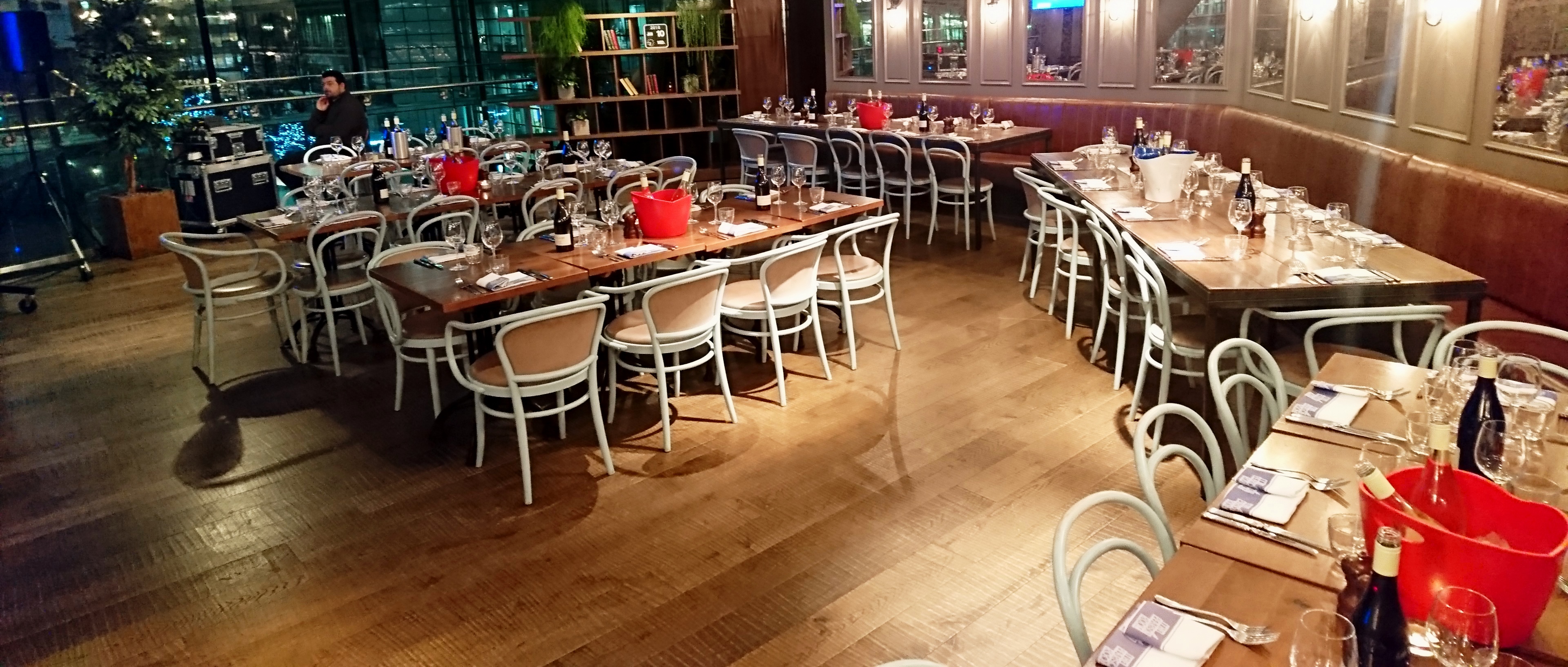 Elegant event space in The Pearson Room with natural light, ideal for networking or dining.