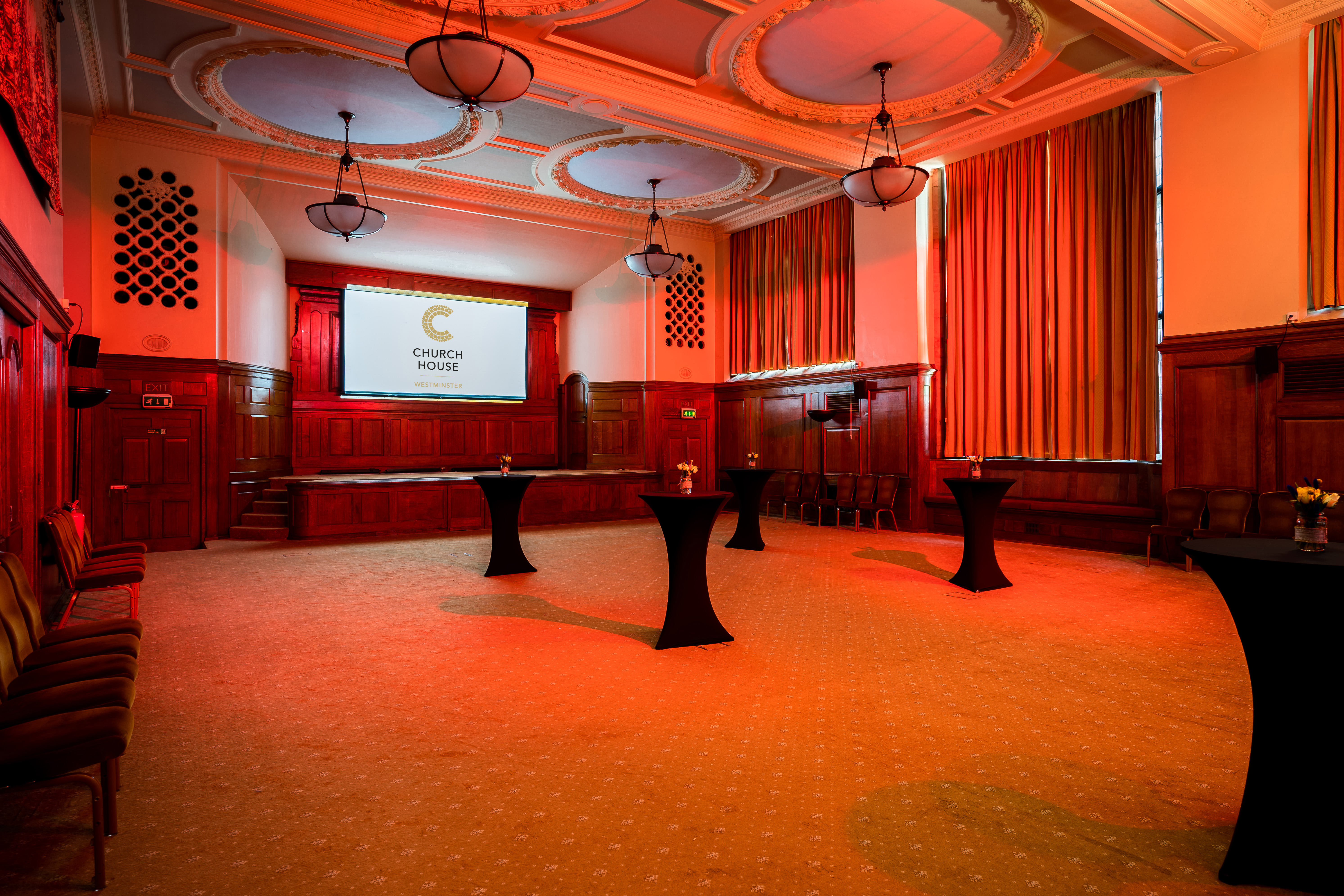 Hoare Memorial Hall: elegant event space with wooden paneling for receptions and networking.