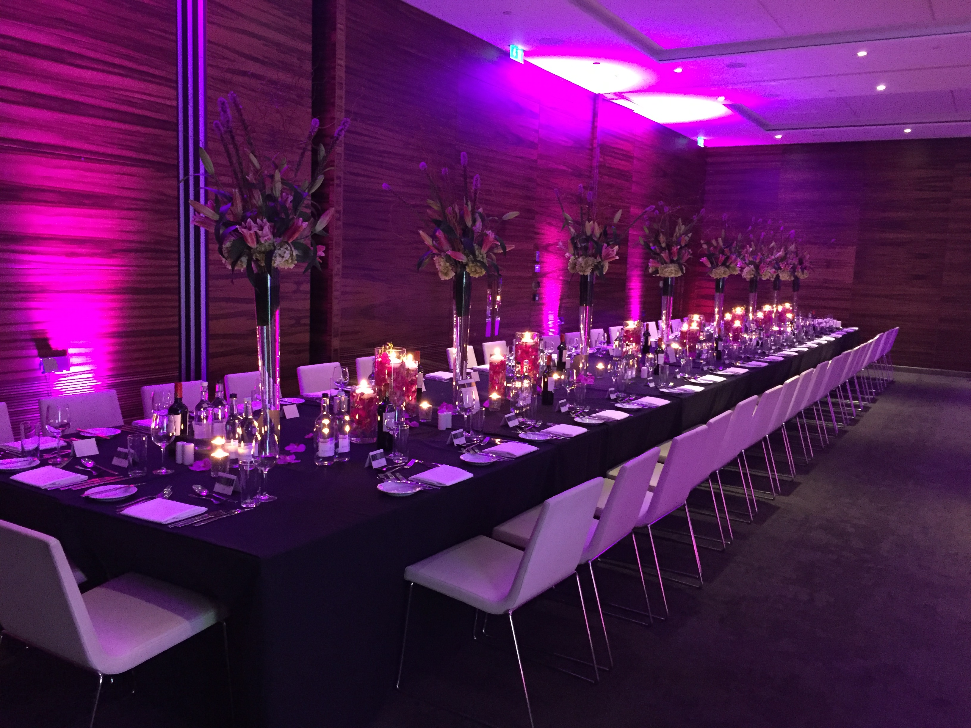 Elegant banquet setup with floral centerpieces in ME London Event Space.