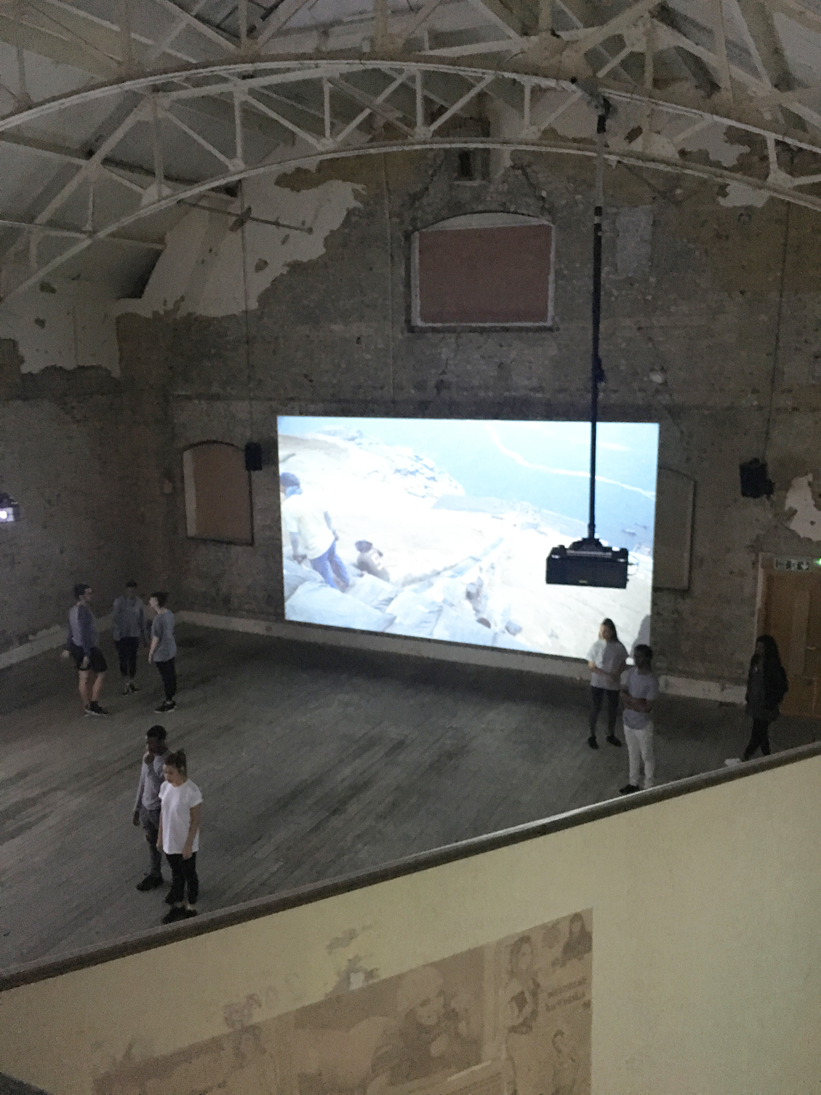 Double Height Auditorium at 133 Rye Lane, featuring exposed brick for creative workshops.