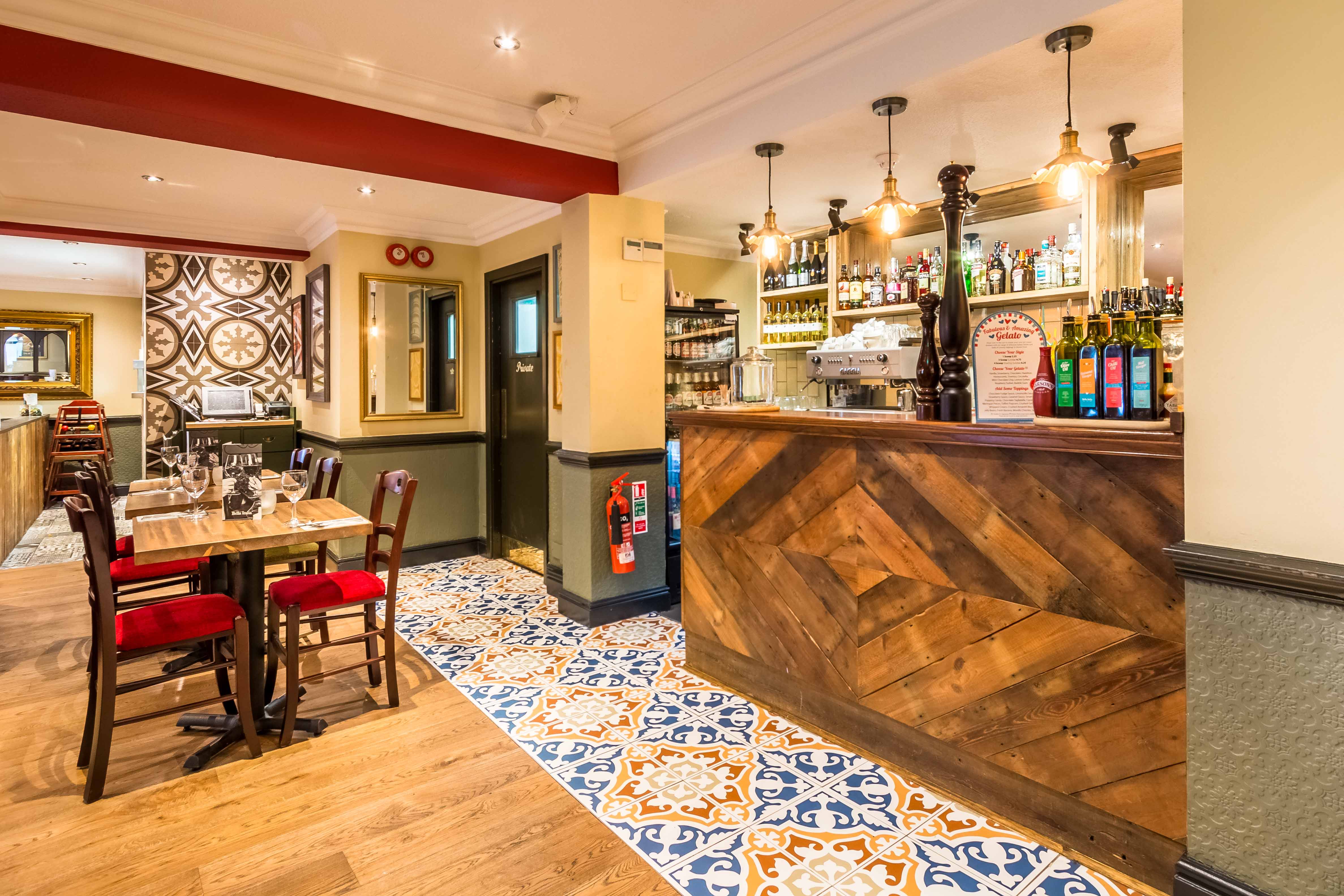 Cozy Roma Room venue in Bella Italia, perfect for gatherings and meetings.