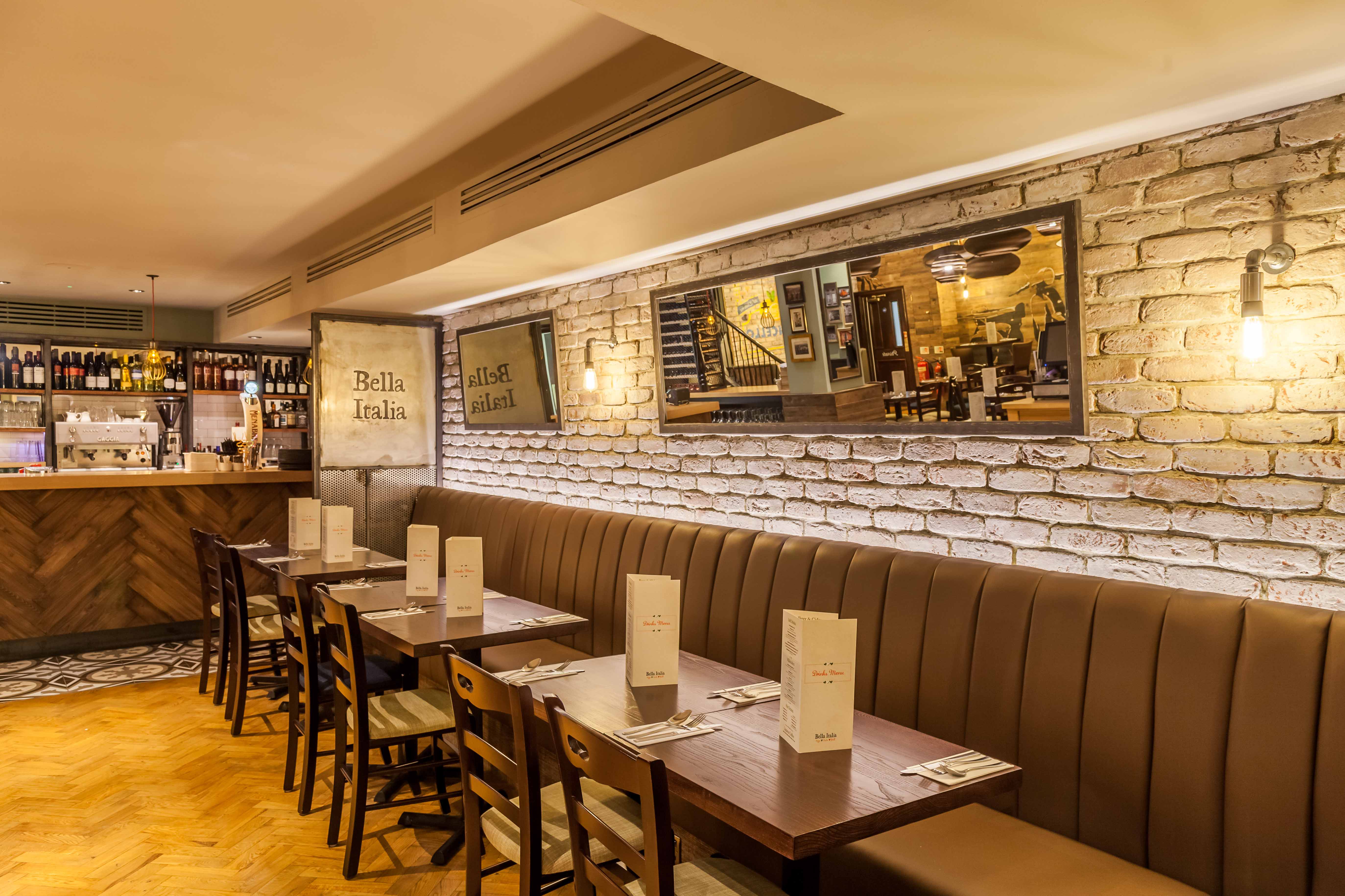 Stylish Napoli Room restaurant with brick walls, ideal for dining and events in Wellington.