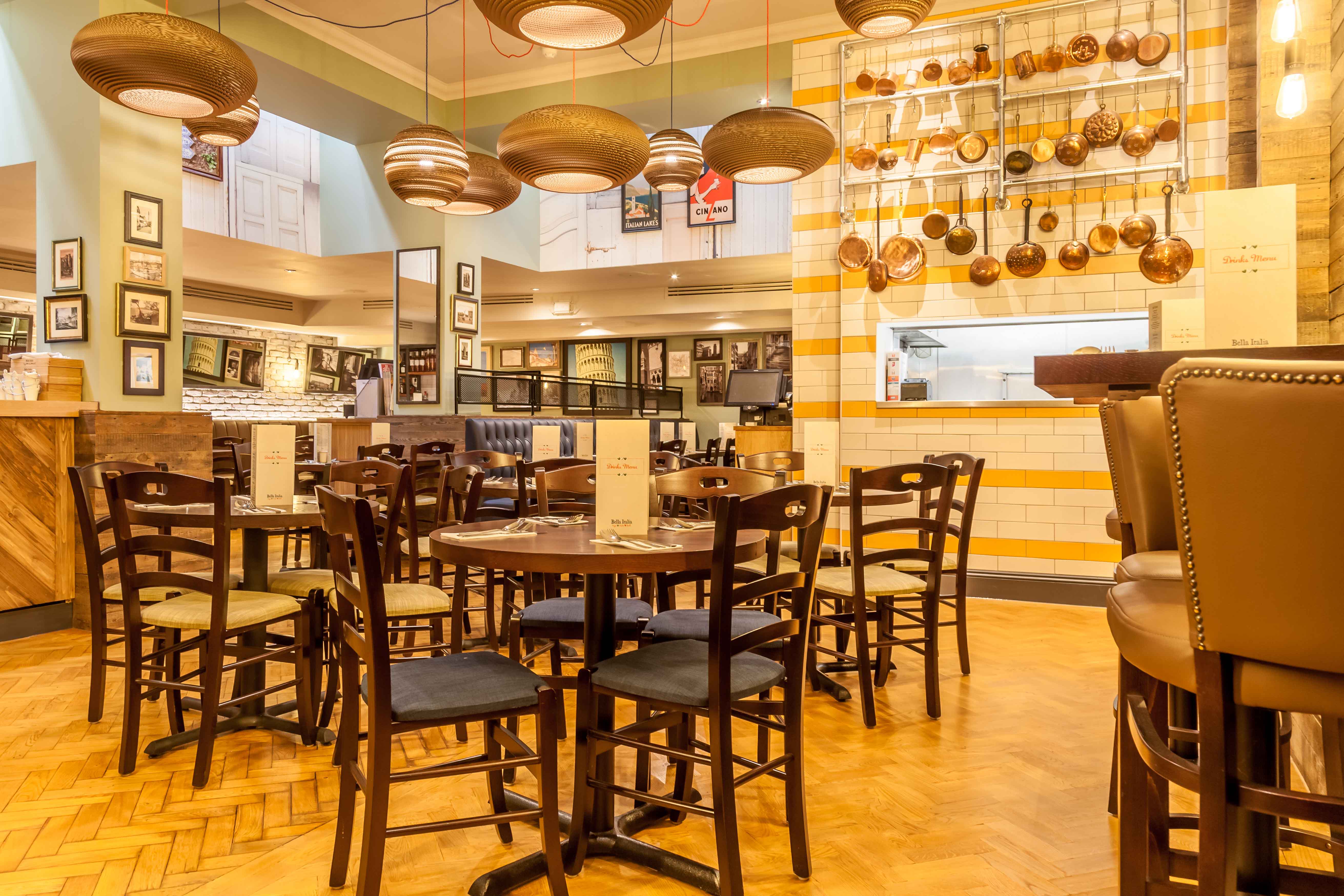 Napoli Room dining space with warm lighting, ideal for intimate gatherings and corporate events.