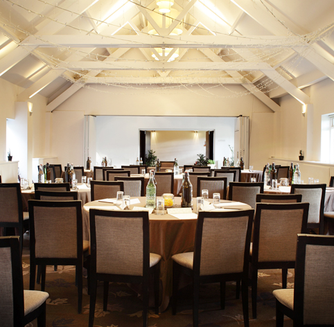 Elegant ballroom setup for formal gatherings, ideal for corporate events and banquets.