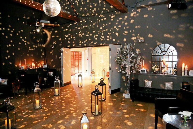 Elegant event space at Lakeside, Stoke Place with soft lighting for weddings and gatherings.