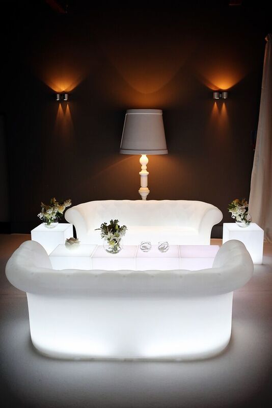 Stylish lounge at Lakeside, Stoke Place with white furniture for upscale events.