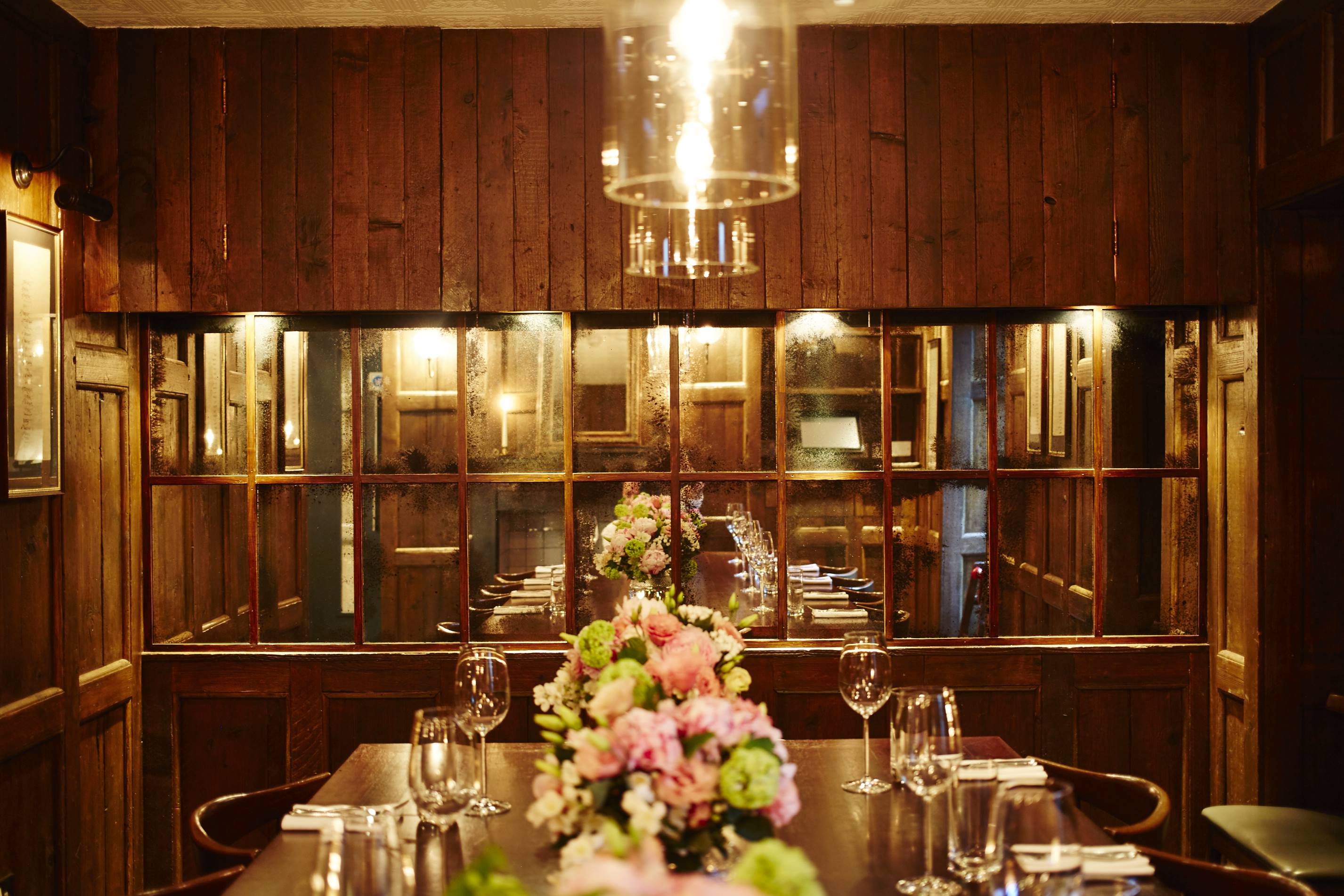 Elegant dining space at Trishna for corporate dinners and intimate gatherings.