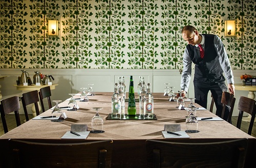 Lower Garden Room at Stoke Place, elegant table setup for corporate events and gatherings.