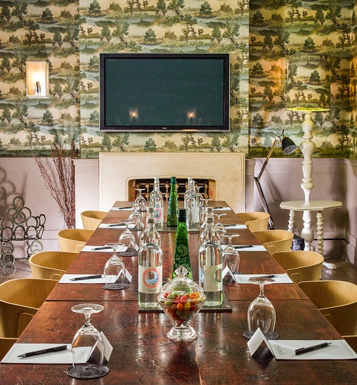 Fly Fishing Room at Stoke Place: elegant meeting space with wooden table for small events.