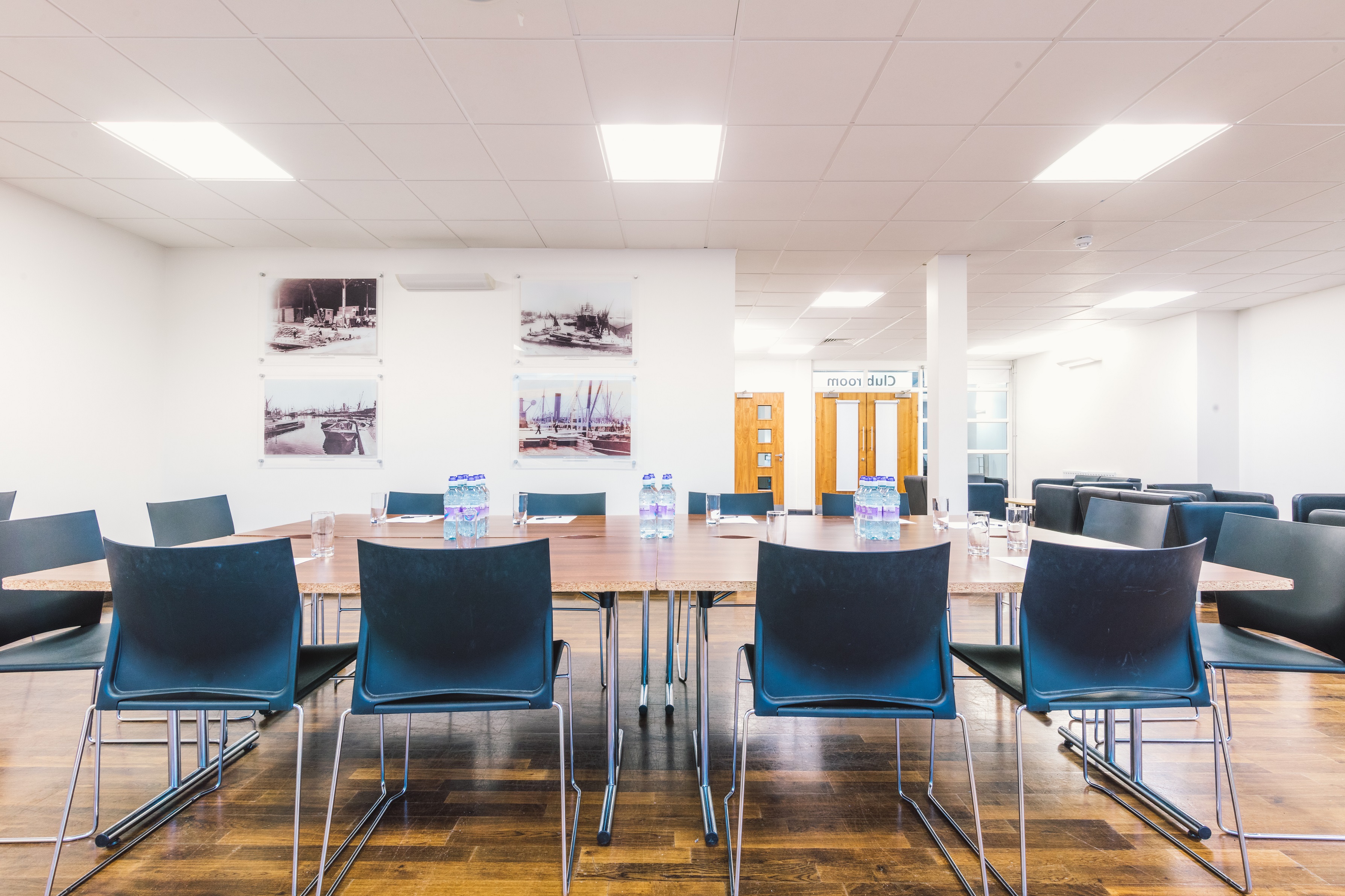 Surrey Docks club room, modern decor, ideal for meetings and workshops.