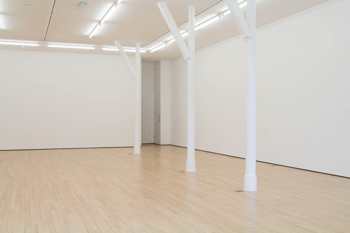 Spacious minimalist event venue in Staffordshire with natural light for corporate meetings.