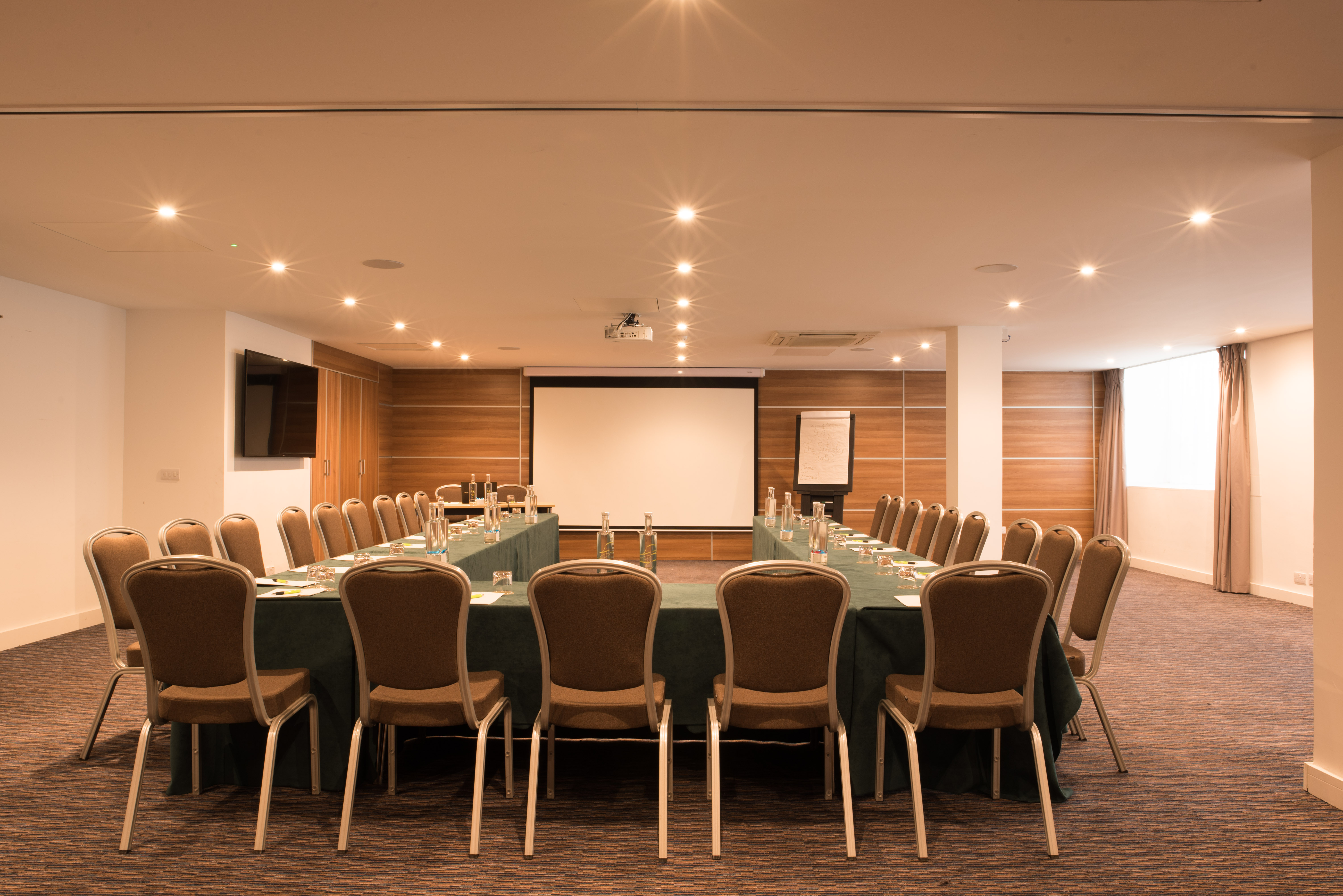 Euston Suite meeting room with large table, ideal for corporate events and workshops.