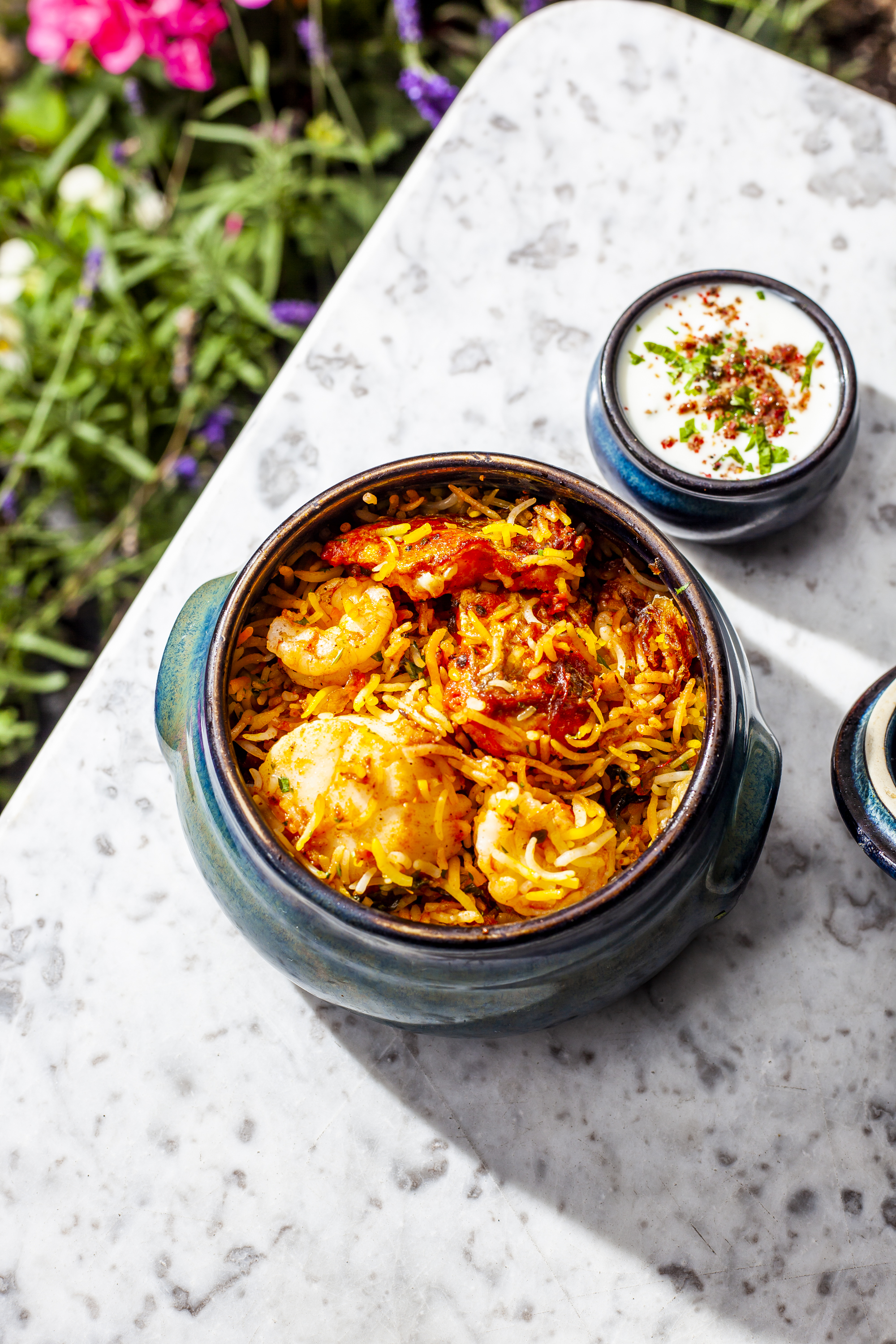 Biryani with shrimp at Trishna for memorable event catering and dining experience.