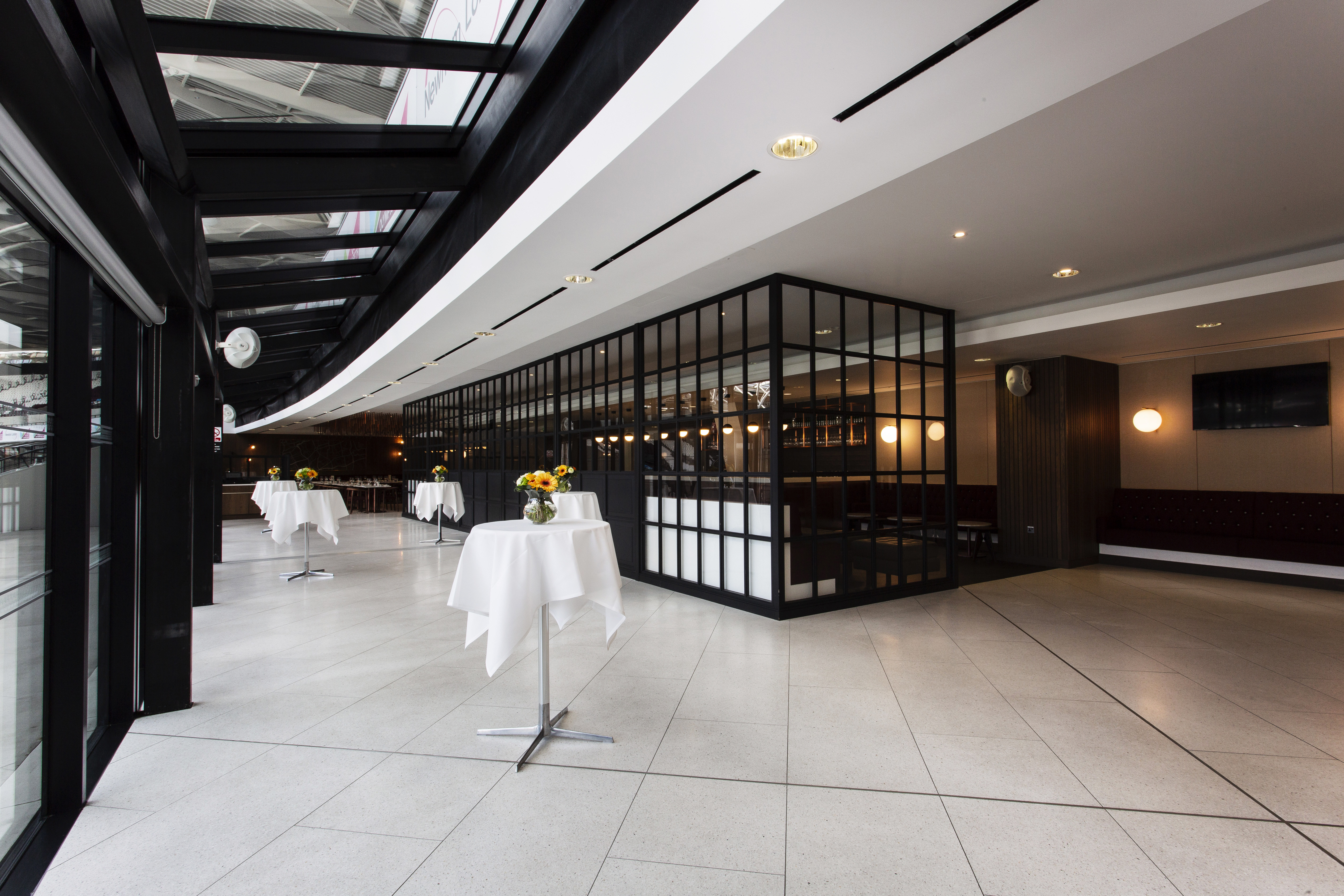 Arnold Hills event space in London Stadium, modern design for networking and receptions.
