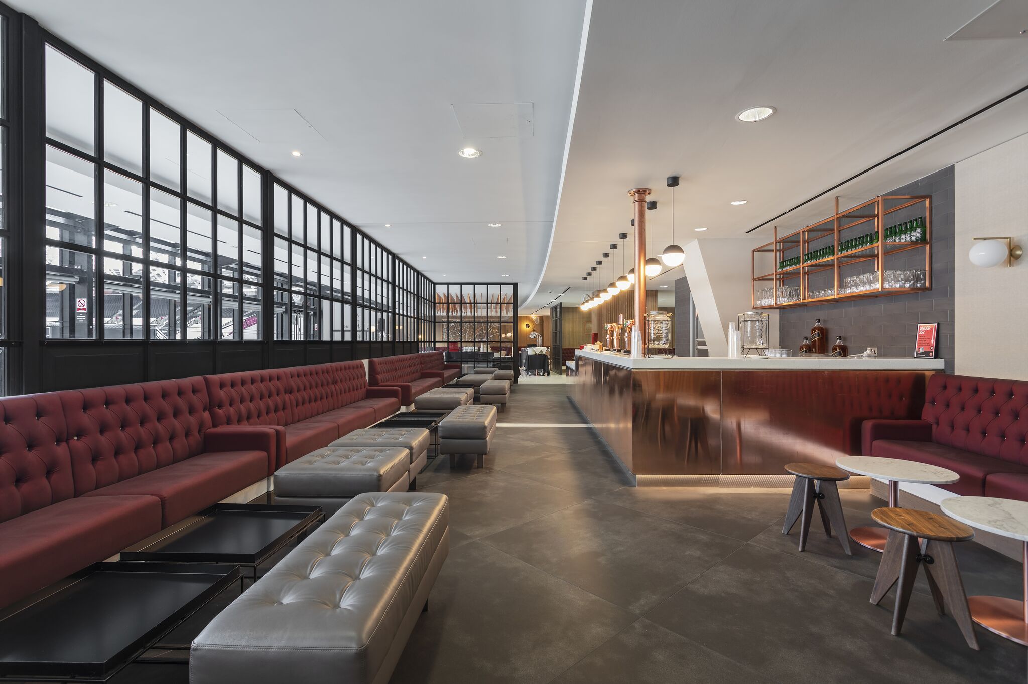 Modern lounge in London Stadium, ideal for networking events and meetings.