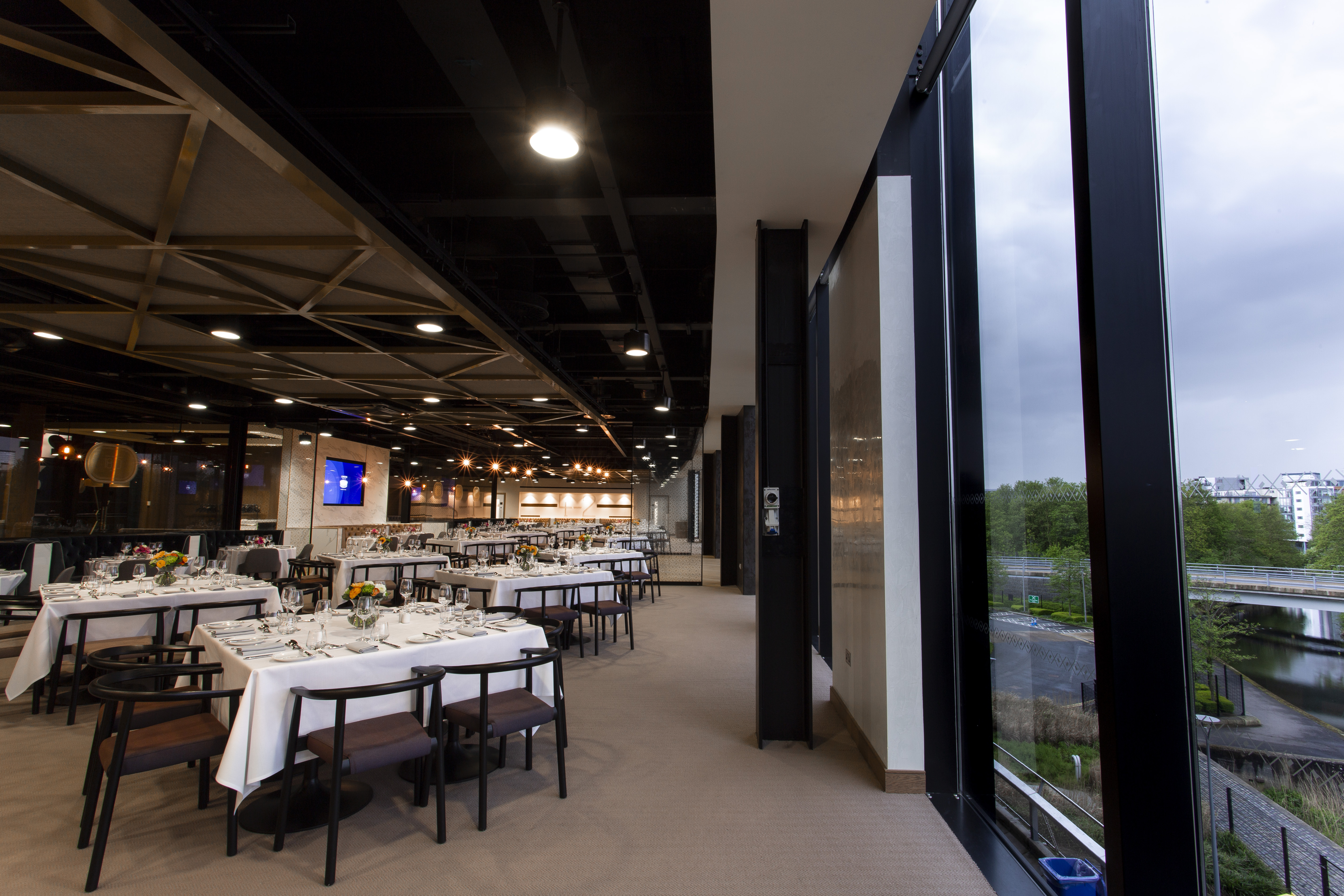 Elegant dining area at The Forge, London Stadium for corporate events and gatherings.
