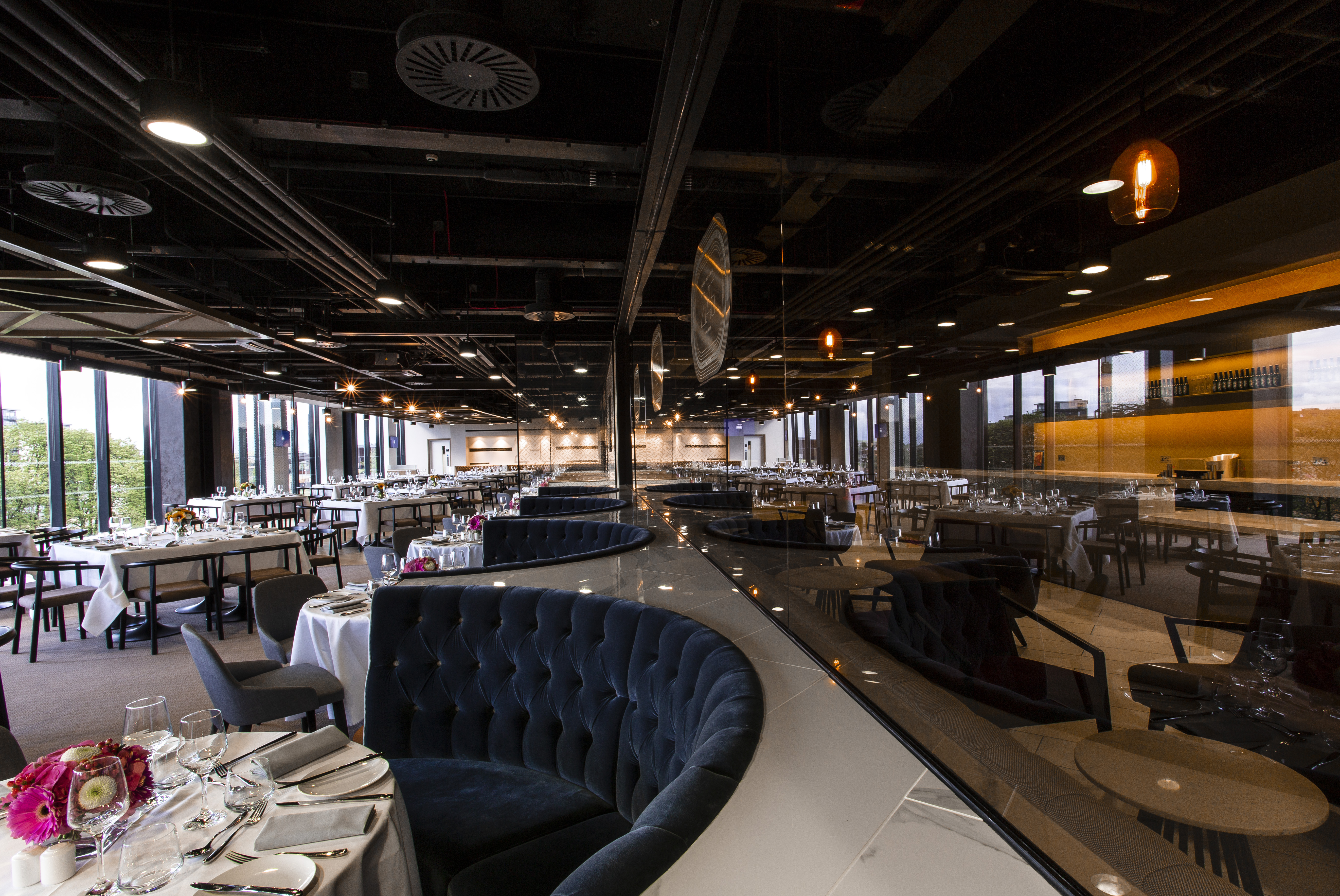 The Forge event space in London Stadium with elegant seating for corporate gatherings.