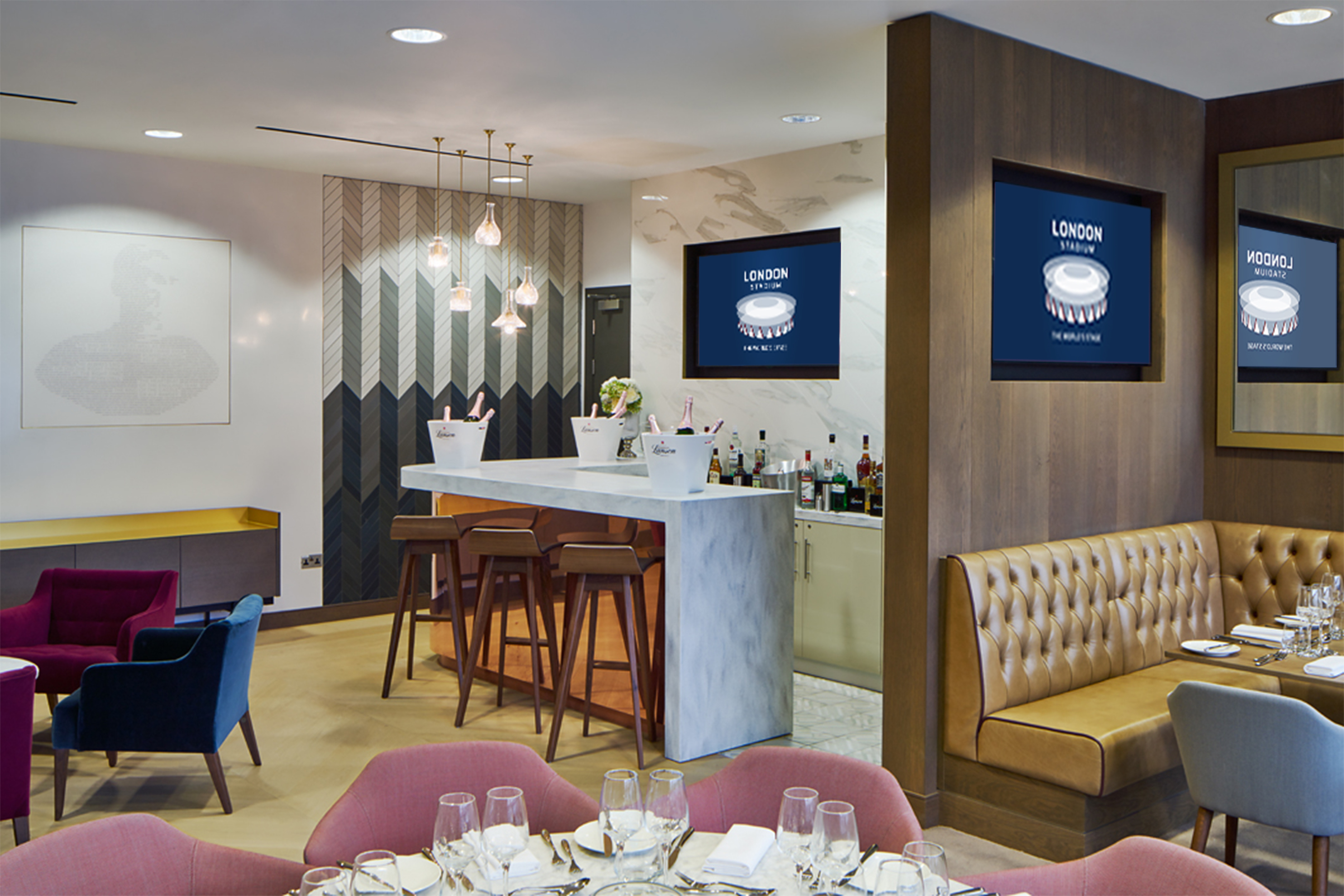 Stylish event space in London Stadium with modern bar, ideal for networking and gatherings.