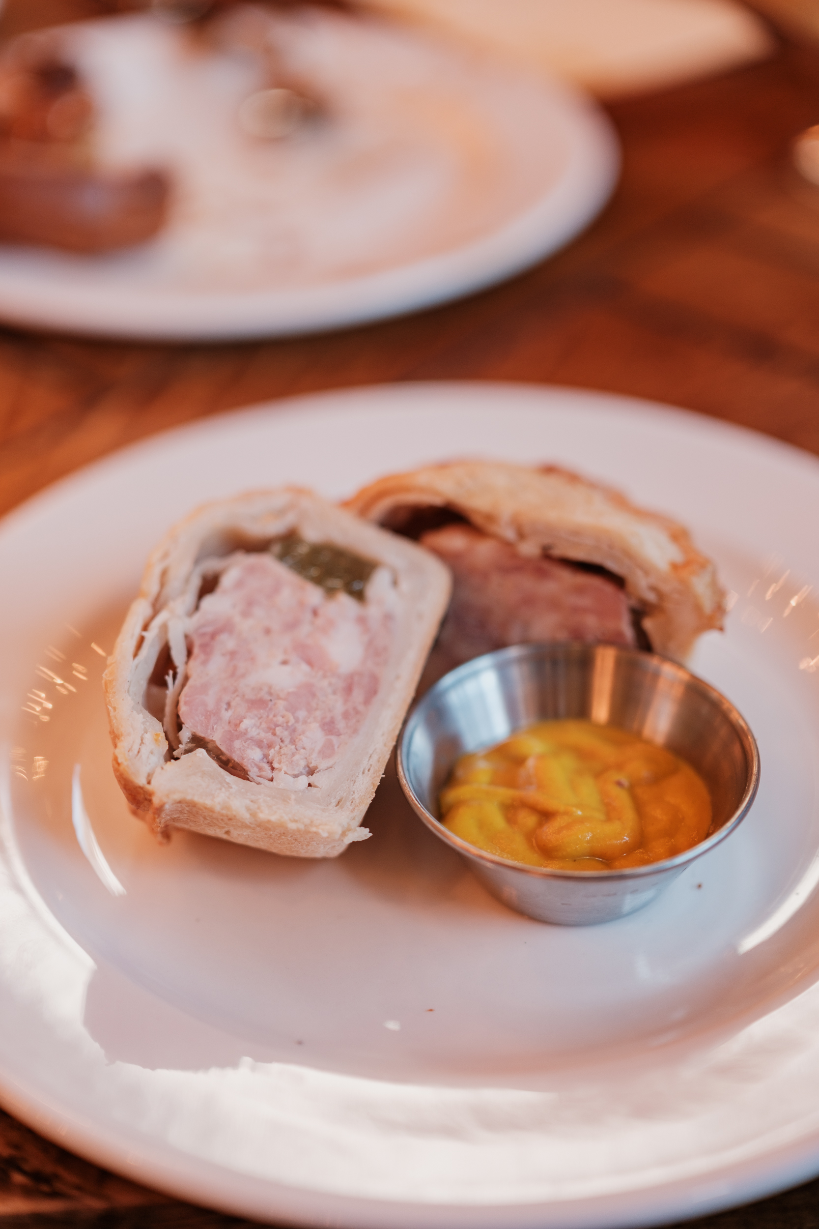 Elegant plated dish in The Admiral's Cabin, perfect for catered events and networking.