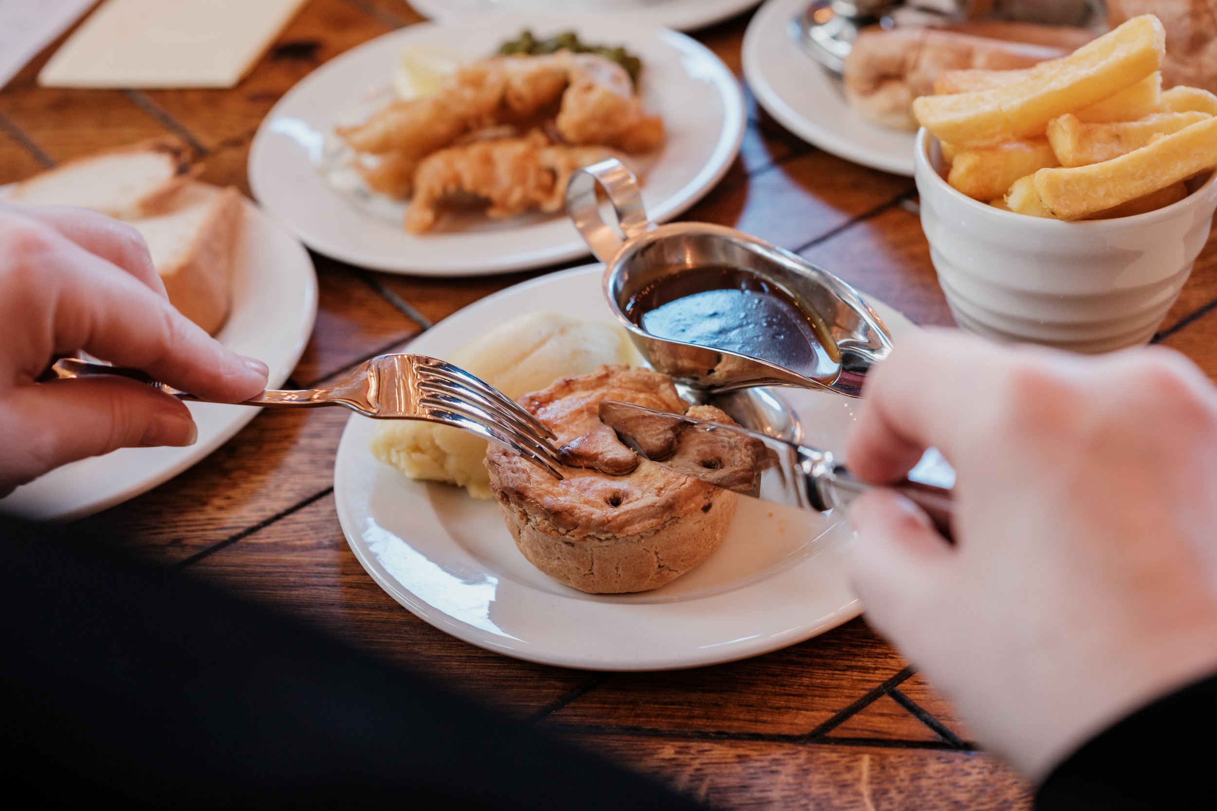 Plated meal in The Admiral's Cabin, showcasing event catering and guest experience.