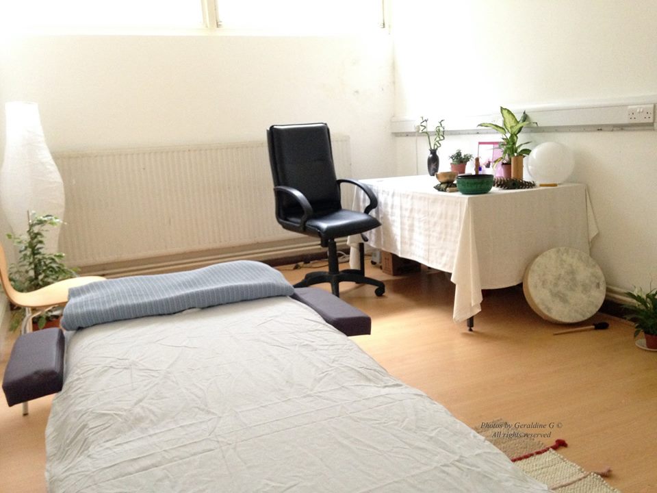 Serene therapy room with massage table for wellness events and relaxation sessions.