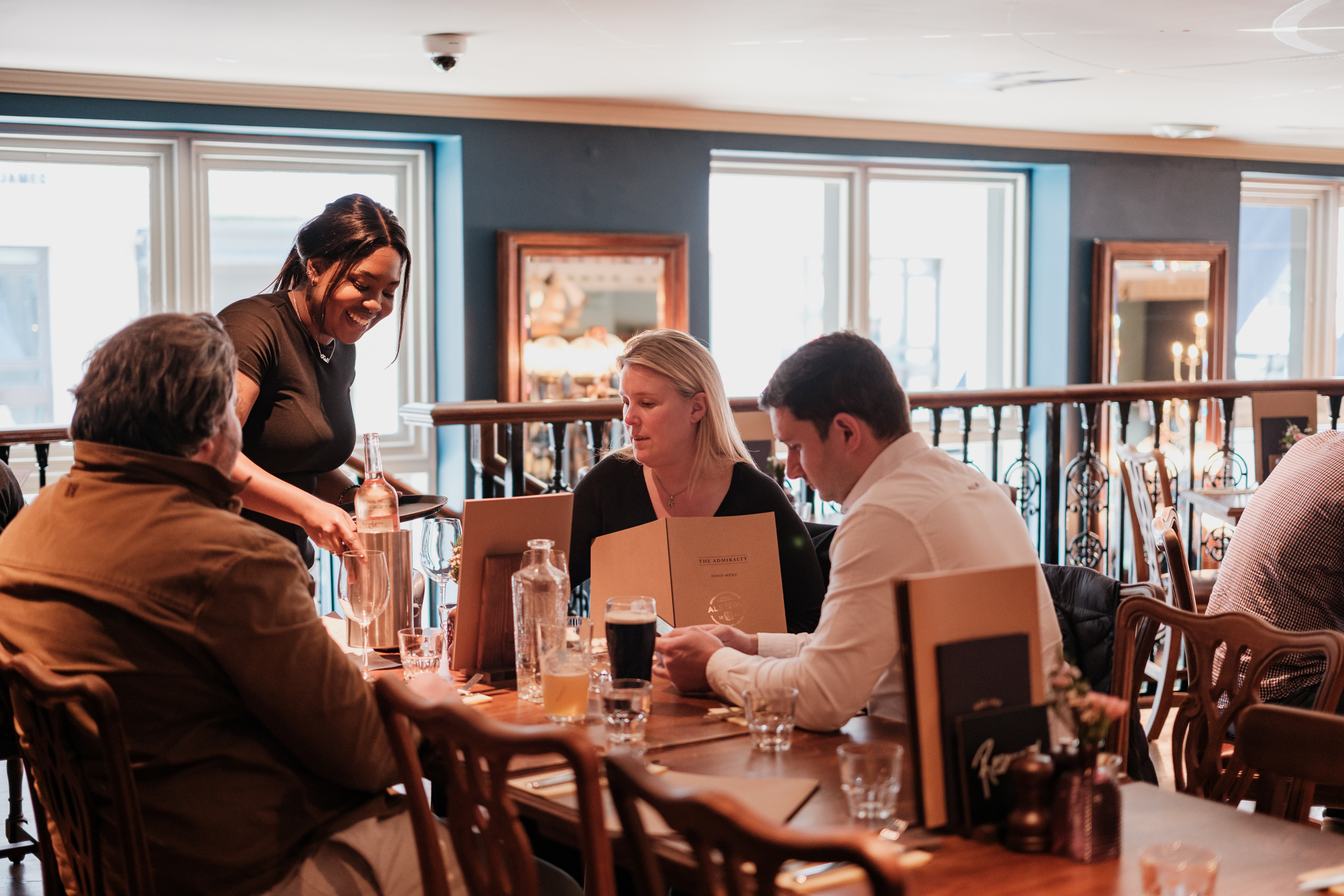 Cozy dining at The Quarter Deck, ideal for networking events with warm ambiance.