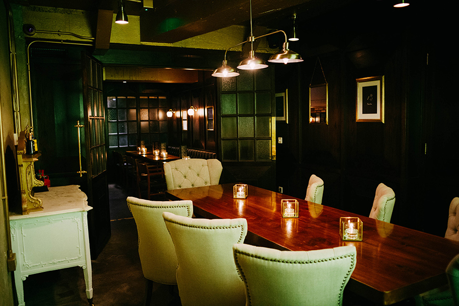 Sophisticated meeting space with wooden table, ideal for executive meetings and presentations.