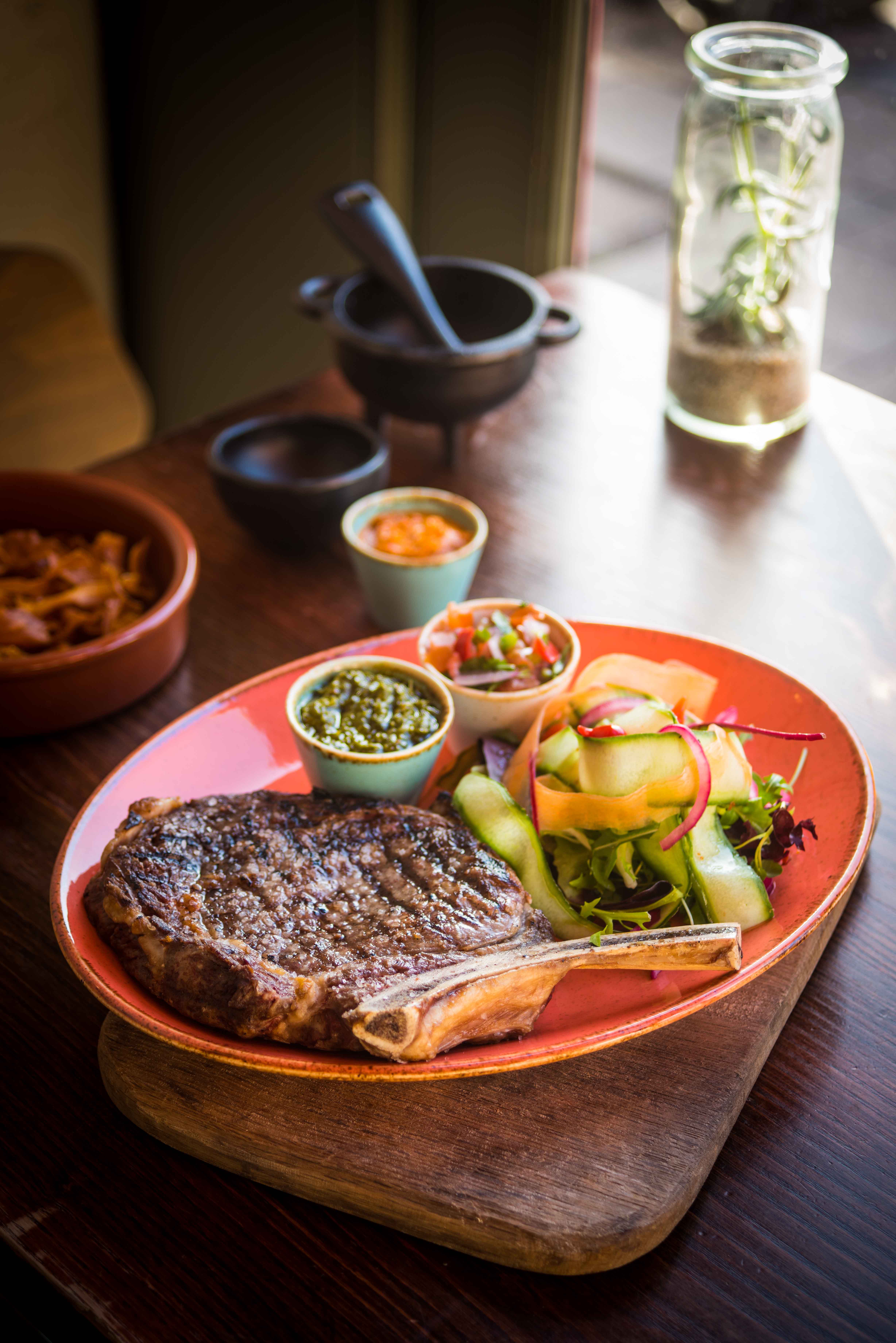 Grilled steak dish at Las Iguanas Royal Festival Hall, perfect for event catering.