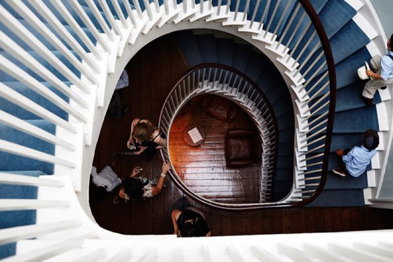 Spiral staircase in Clissold House, perfect for elegant events and gatherings.